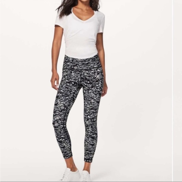 lululemon athletica Pants - Lululemon black white patterned leggings size 8 zipper pocket high times